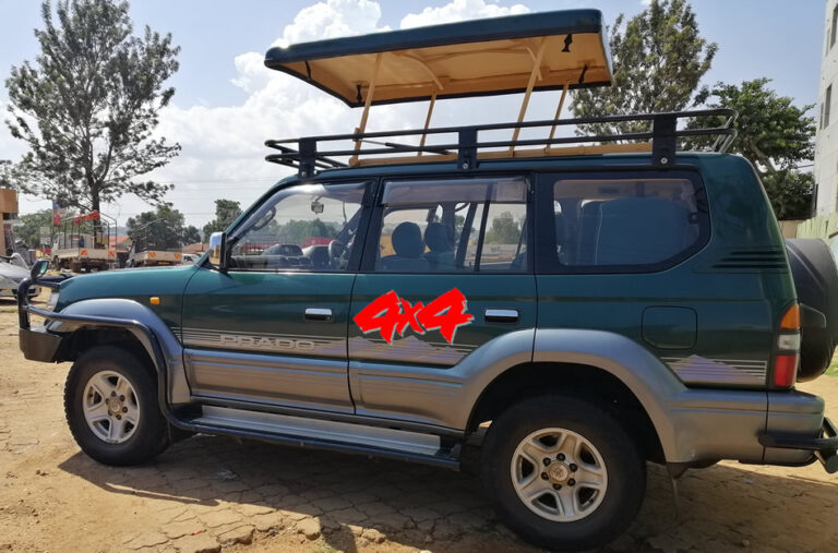 4x4 Pop-up-Land-cruiser-safari cars are best view for wildlife safari and photography, and can handle different types of roads, including rough terrains, steep hills, and muddy tracks.